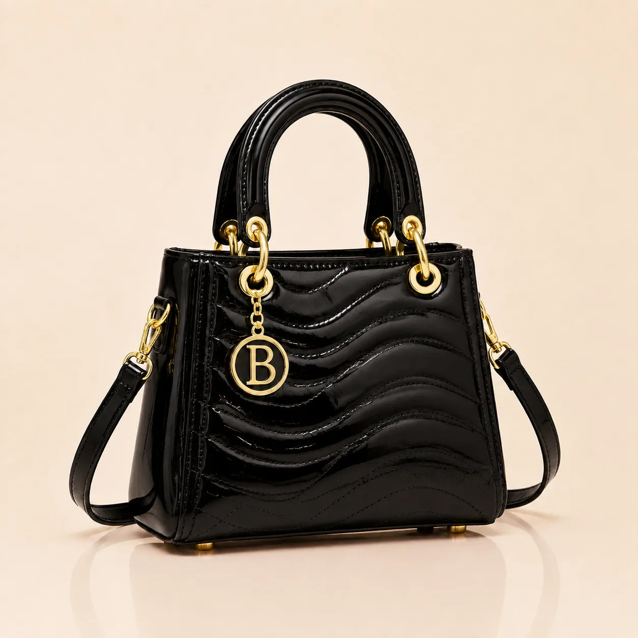 The Signature Bag in Black with gold B charm