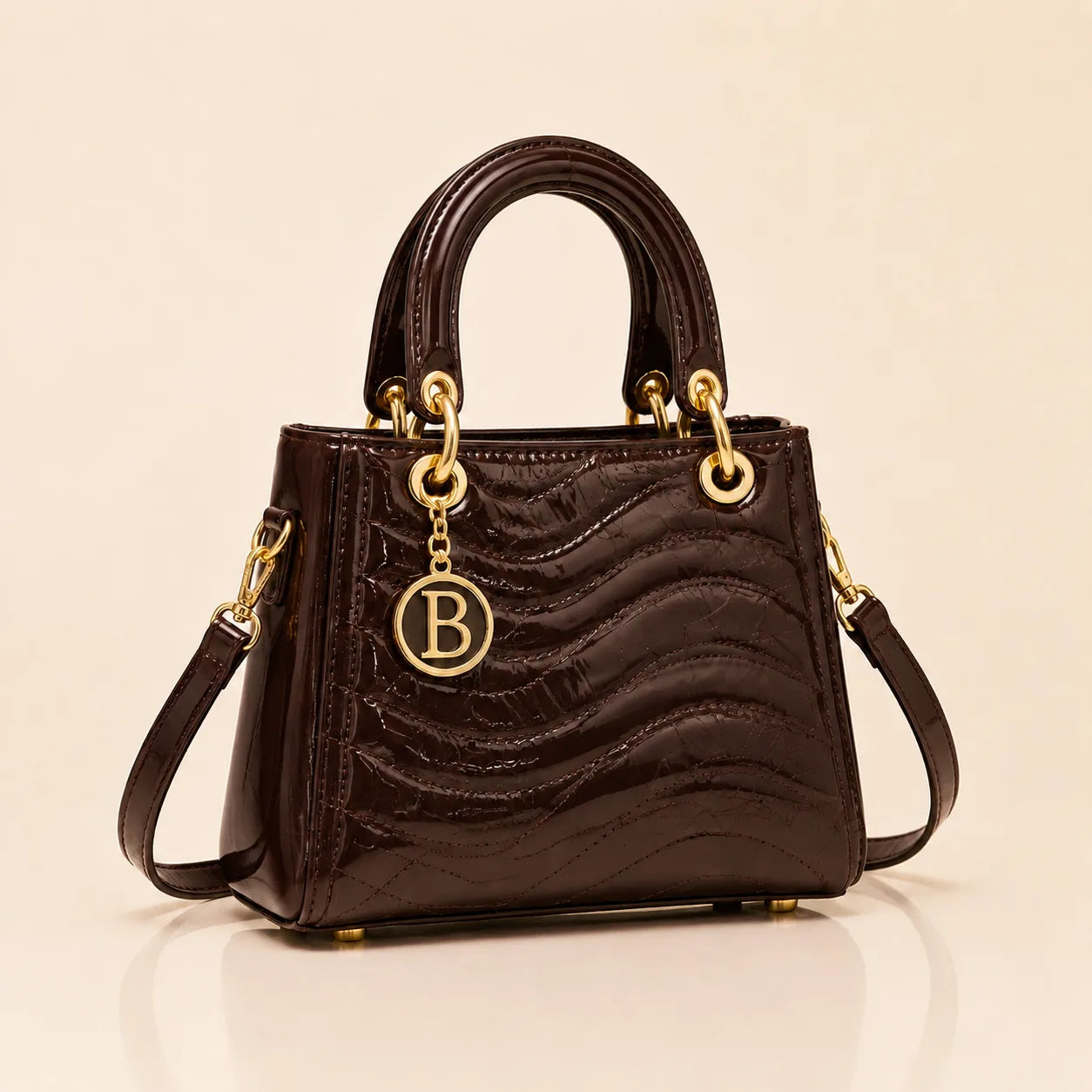 The Signature Bag in Chocolate with gold B charm
