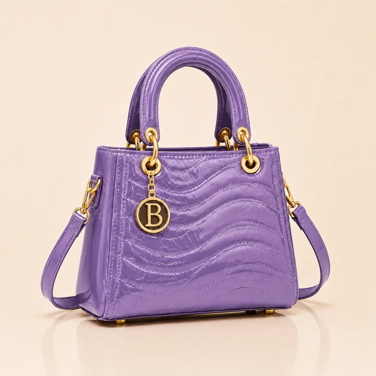 The Signature Bag in Lavender with gold B charm