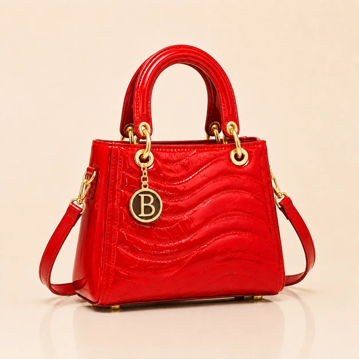 The Signature Bag in Red with gold B charm